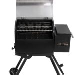 Wood pellet grill smoker control panel and cooking chamber